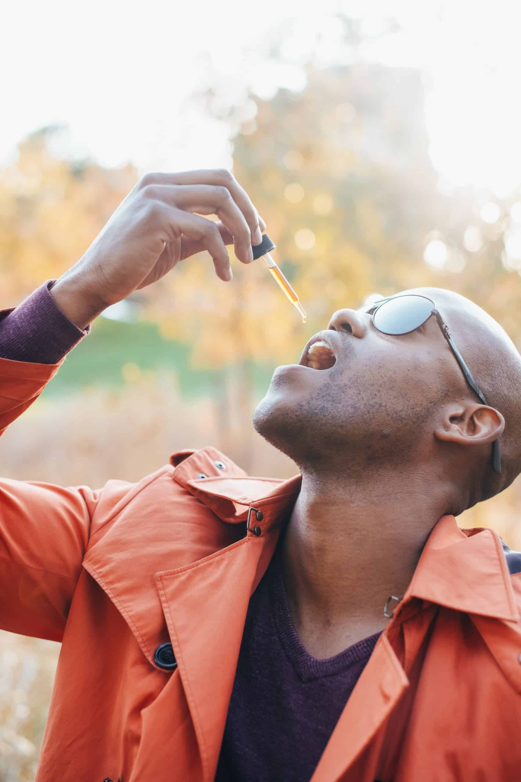man enjoying CBD oil benefits